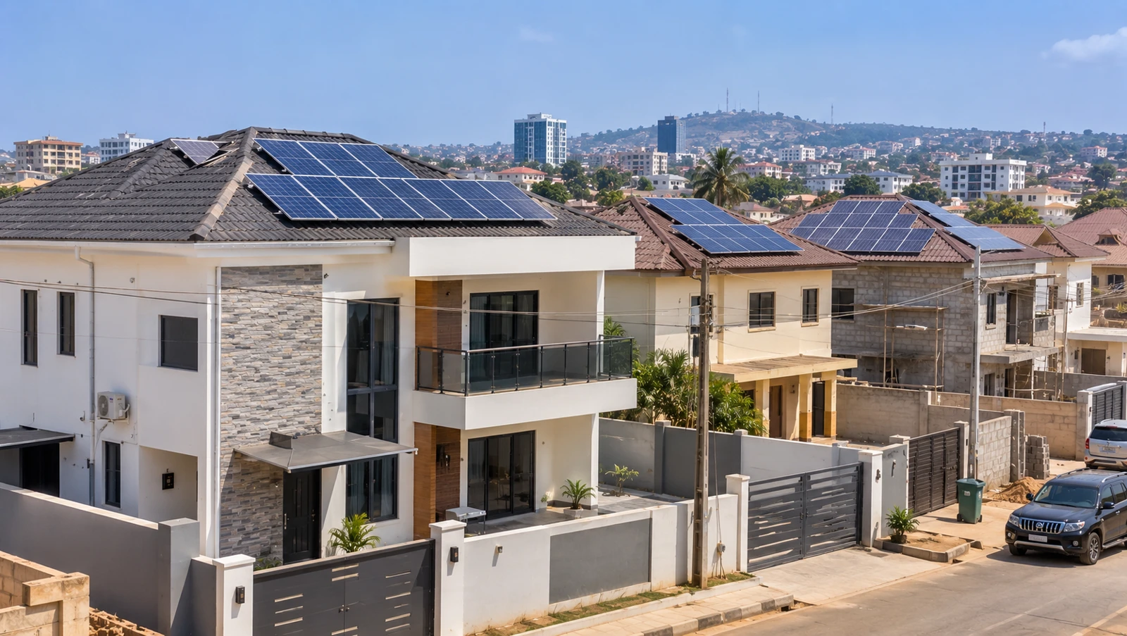 Illustrative homes and residential developments in Accra with rooftop solar panels